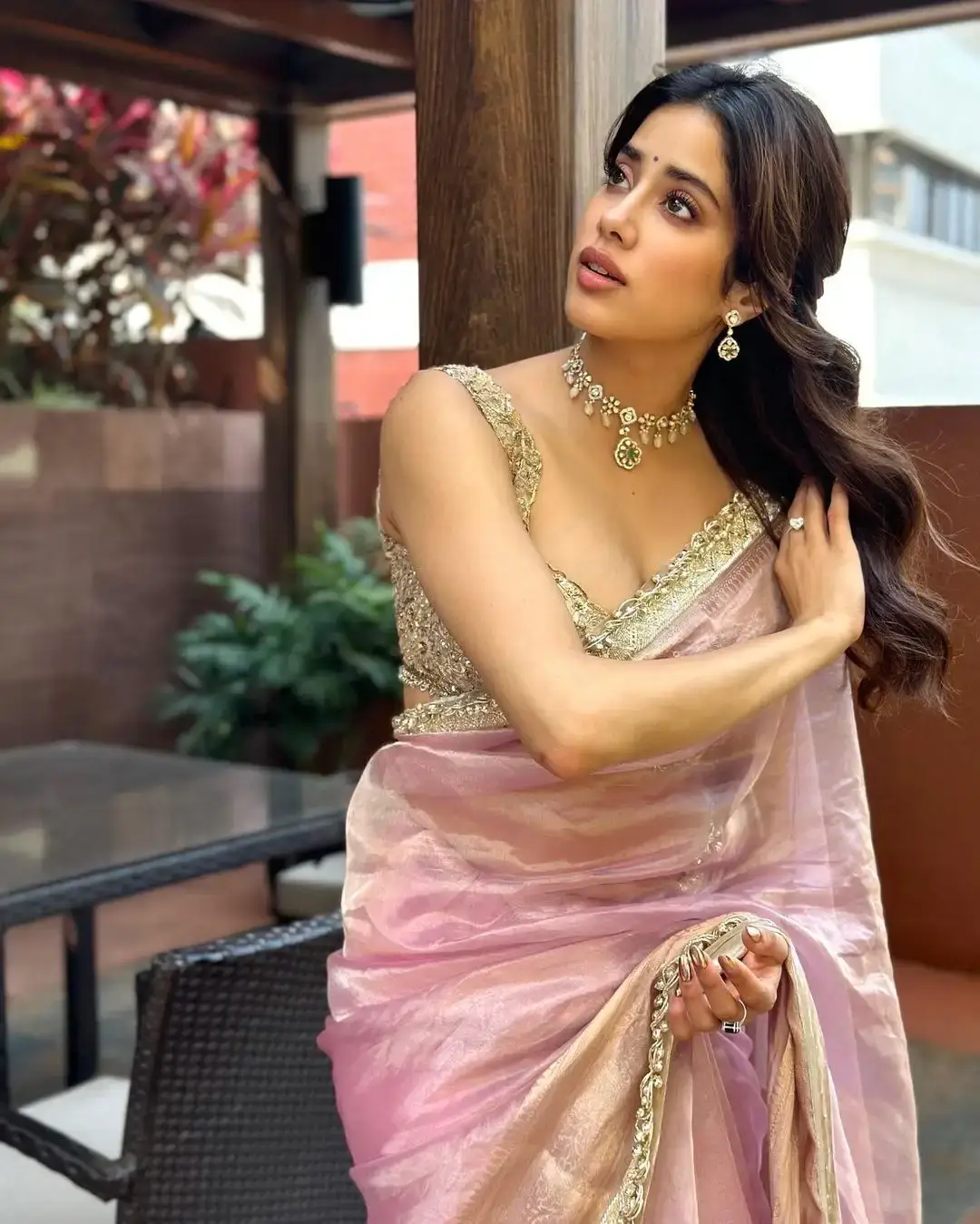 Bollywood Actress Janhvi Kapoor in Sleeveless Pink Saree